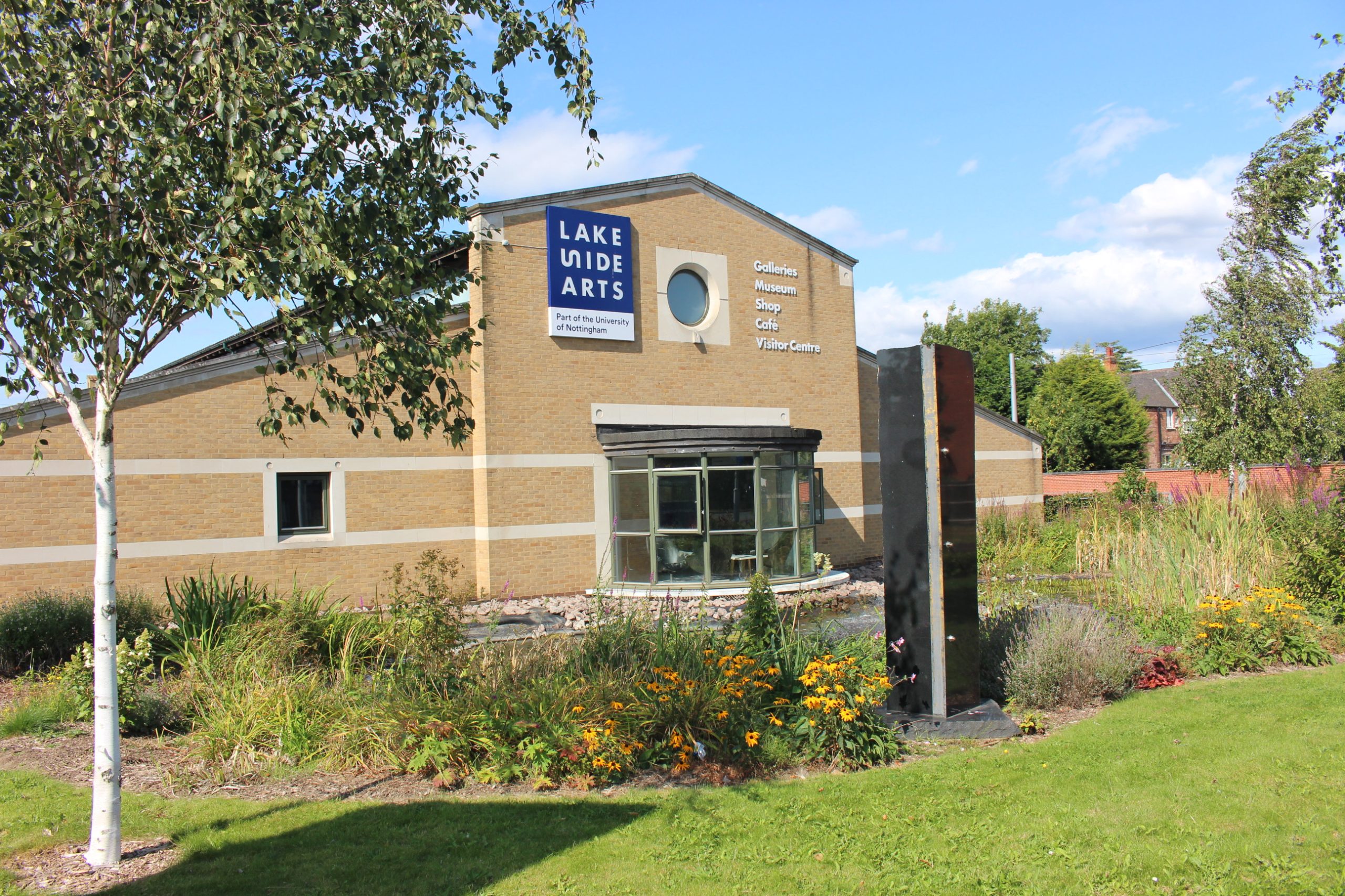 Lakeside Arts Djanogly Gallery building surrounded by greenery and trees